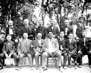 People seated on a bench