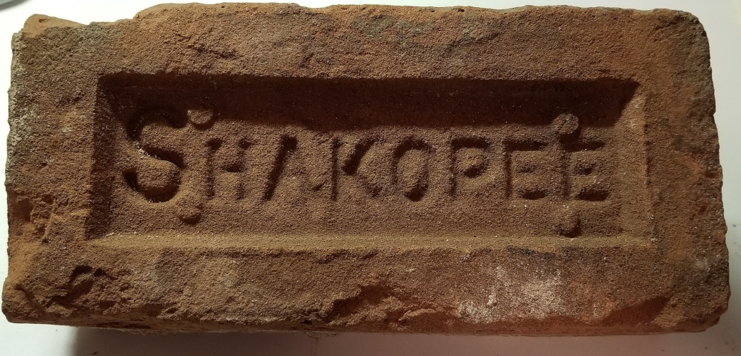Shakopee-stamped brick
